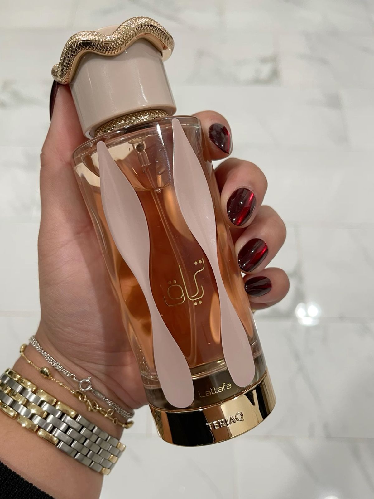 عطر زنانه مدل تریاق حجم 100میلی لیتر