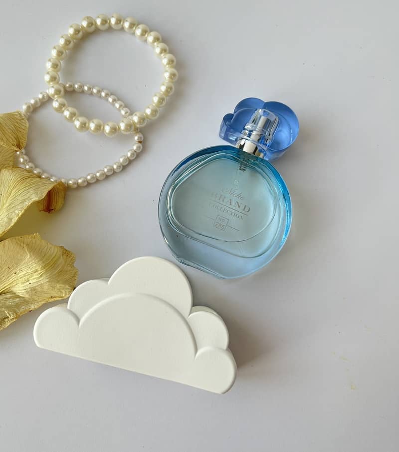 عطر ادکلن مینیاتوری آریانا گراند کلود زنانه برند کالکشن حجم 25 میلی لیتر